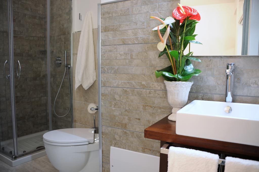Piazza Martiri Rooms กาญารี ห้อง รูปภาพ