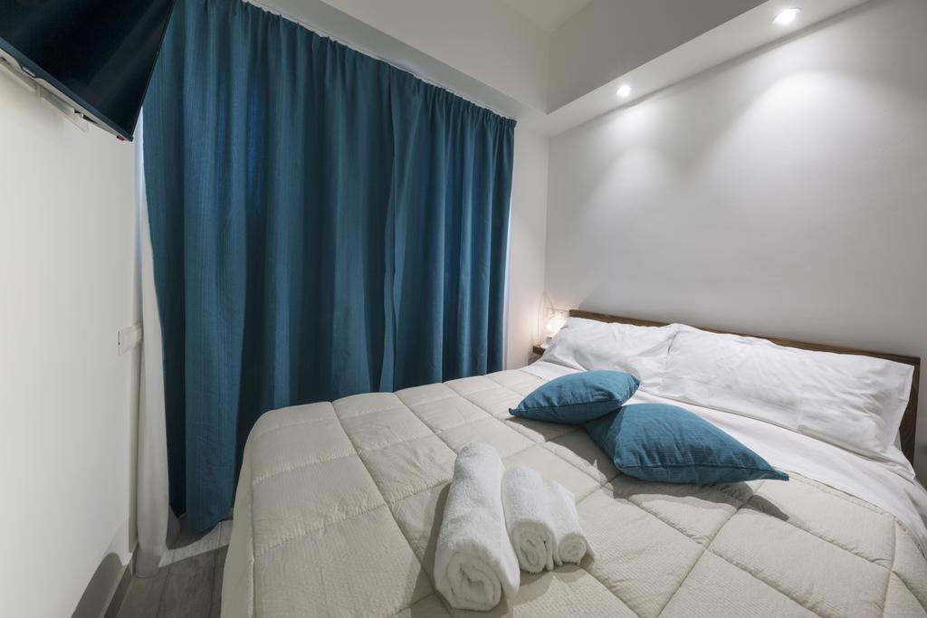 Piazza Martiri Rooms กาญารี ห้อง รูปภาพ